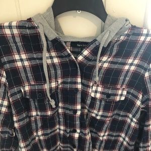 A casual flannel button up with hood